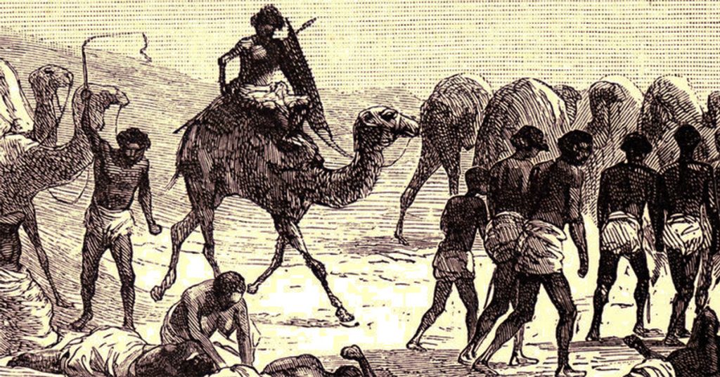 Karawana niewolników pędzonych przez Saharę.