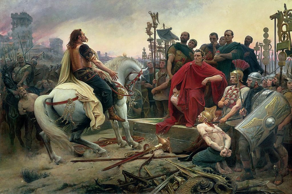 Kapitulacja galijskiego wodza Wercyngetoryksa przed Cezarem. Obraz pędzla Lionela Royera (domena publiczna).