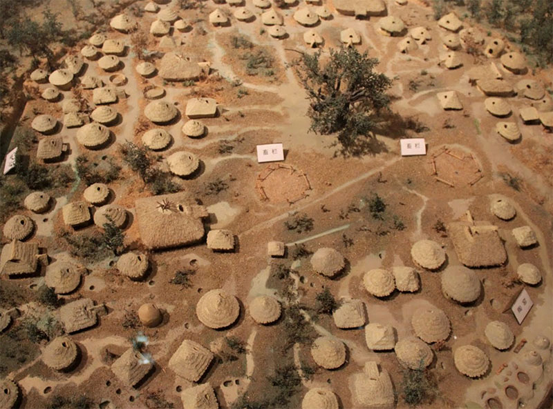 Model neolitycznej wioski w dolinie rzeki Jangcy.