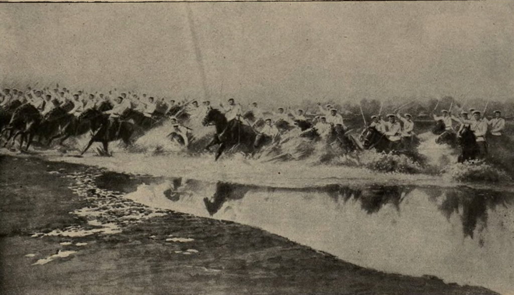 Atak rosyjskiej kawalerii na zdjęciu prasowym z 1914 roku (domena publiczna).