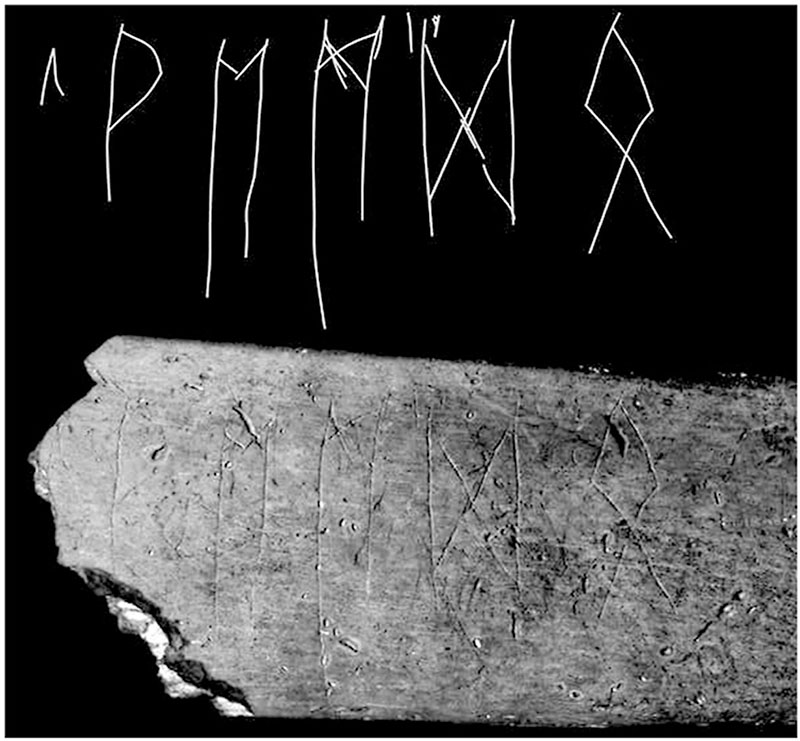 Runiczna kość z Czech i umieszczony na niej tekst, odczytywany jako THEMDO